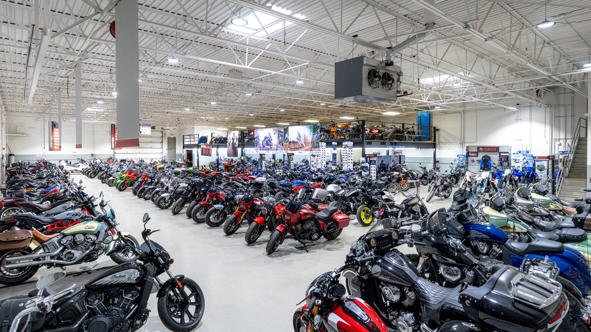 Rows of motorcycles on the showroom floor at iMotorsports Chicago in Elmhurst