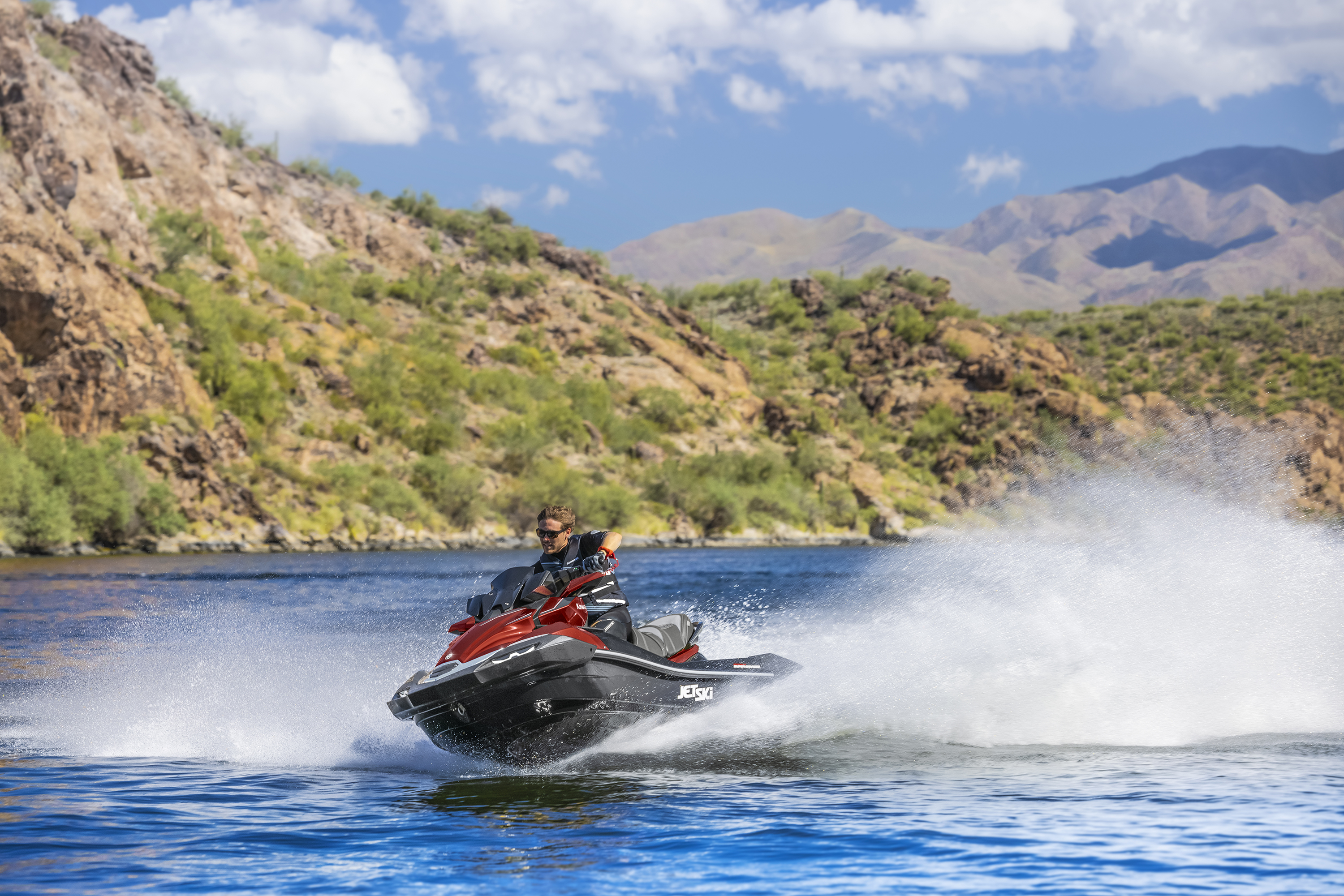 Red personal watercraft on the water
